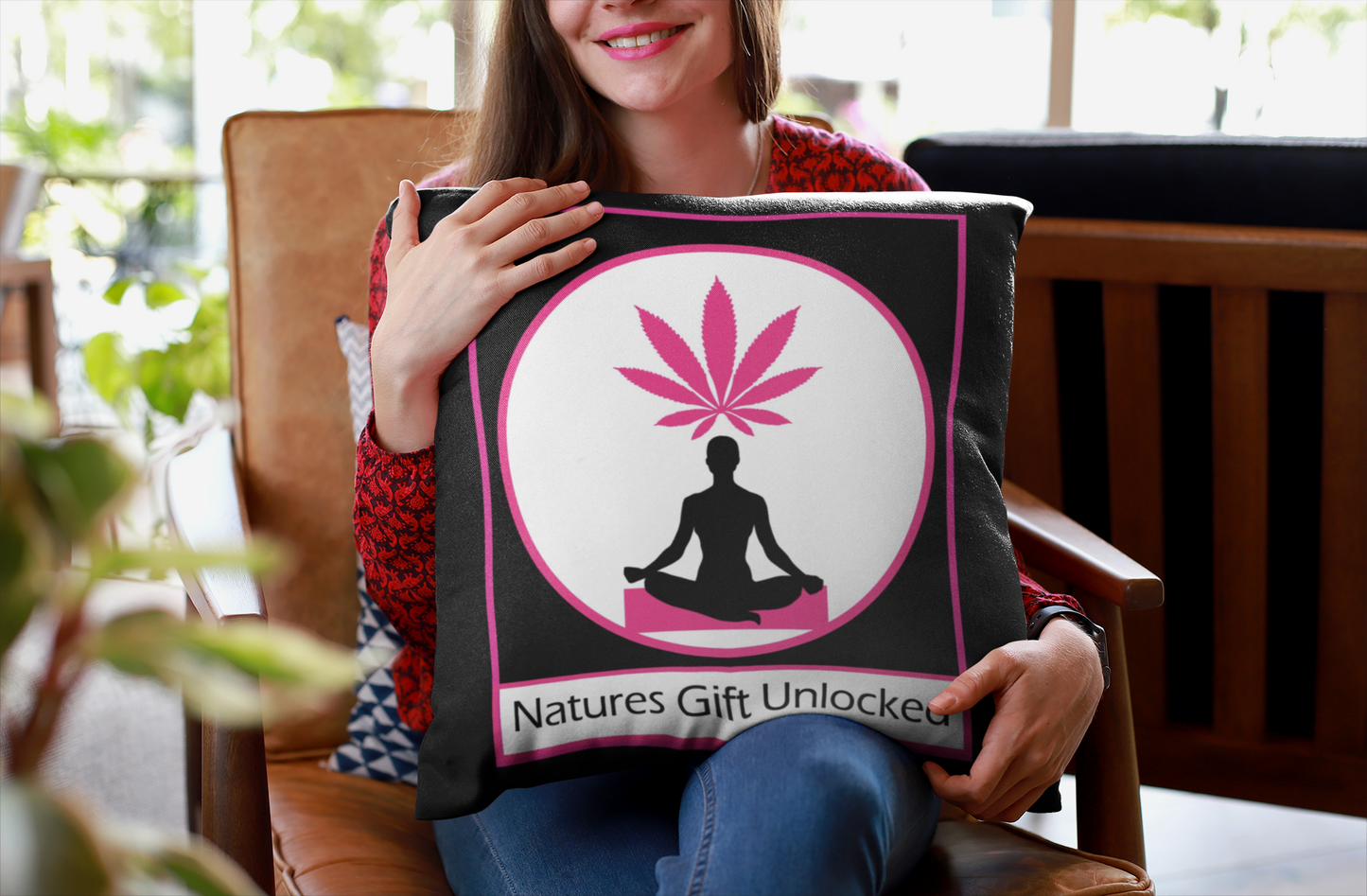 Your next fave black and pink accent pillow: a meditating figure bringing all the chill vibes to your space.